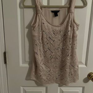 White House Black Market blush tank style blouse with silver accents